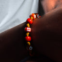 Dettaglio murrine vetro di Murano rosse e arancioni bracciale uomo Procida - Dandy Street