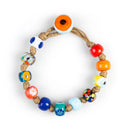 Bracciale da uomo che incarna la moda maschile con Murrine veneziane, di fattura artigianale e chiusura a bottone, un compagno di viaggio prezioso